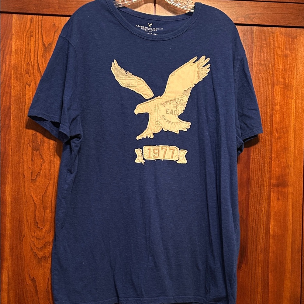 American Eagle Outfitters Navy Blue T-Shirt with Cream Eagle Graphic